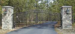 Ornamental Iron Powder Coated Gate With Brick Columns And Lights